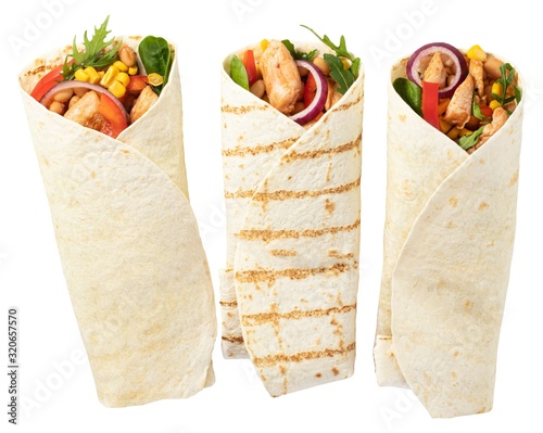 Tortilla wrap with fried chicken meat and vegetables isolated on white background