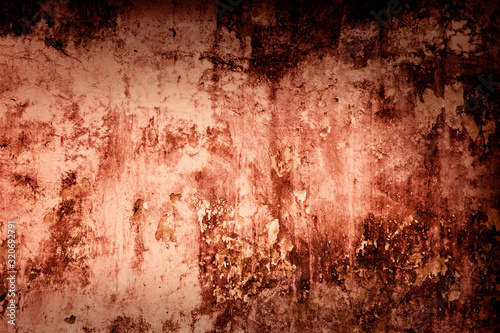 Texture of an grunge concrete wall. Halloween background. Blood Texture Background. Texture of Concrete wall with bloody red stains.