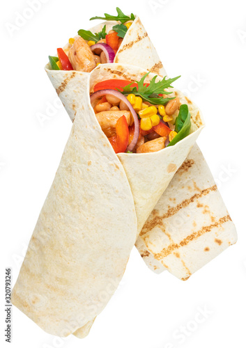 Tortilla wrap with fried chicken meat and vegetables isolated on white background