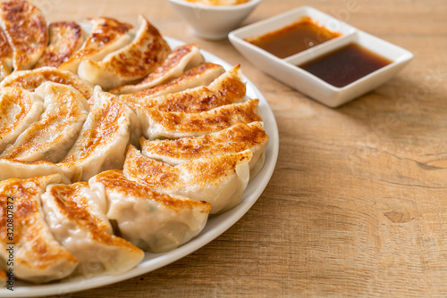 fried gyoza or dumplings snack with soy sauce