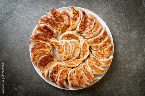 fried gyoza or dumplings snack with soy sauce