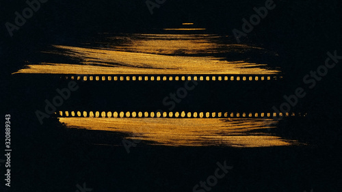 Silhouette of a film strip on a black background in a golden frame.