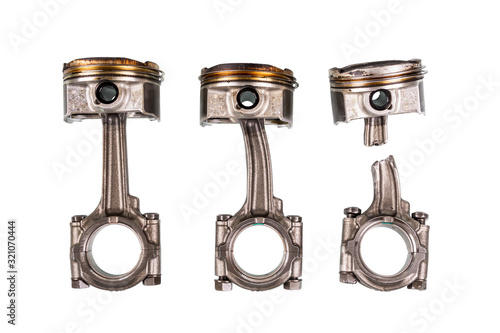 Piston and connecting rod damage isolated on white background with clipping path