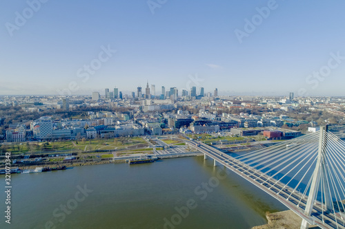 WARSAW. POLAND. Bridge and panorama of beautiful Warsaw city in the morning sun. Vistula River. 