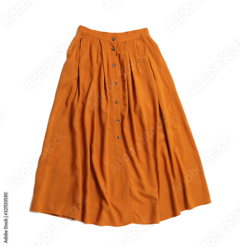 Elegant long orange skirt isolated on white, top view