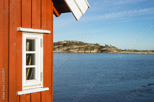 Vintage cabins by archipelago coastline of Southern Norway