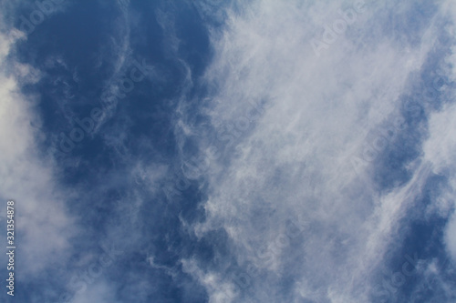 The vast blue sky and clouds sky. blue sky background with tiny clouds. blue sky panorama.