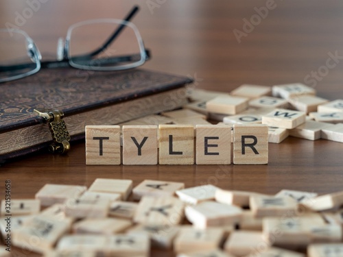 tyler concept represented by wooden letter tiles