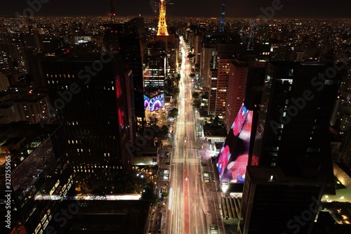 Panoramic view of a illuminated avenue em São Paulo, Brazil. Paulista Avenue. Great landscape. Colorful scenery.