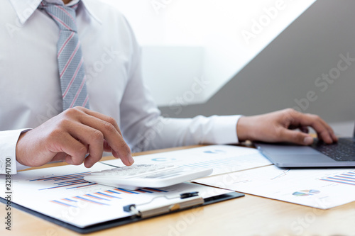 Businessmen use graphs to summarize results and calculate income-expenses to find financial balance points and use them to improve and advance business, finance and economic concepts.