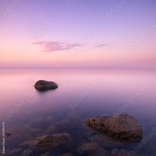 Landscape with calm water on sea