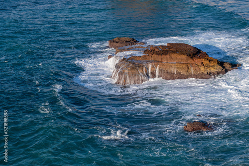 Beautiful rocky coastline and blue sea in Portugal