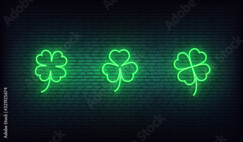 Clover neon icons. Set of green Irish shamrock icons for Saint Patrick's Day
