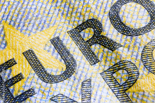 macro photography of the intaglio print on a five euro banknote, high resolution capture. Sharp detailed shot of the euro character on the ecb 5 euro note. the embossing of the print nicely to see