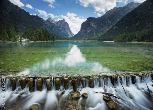 View of lake Dobbiaco, Dolomites, Italian Alps.