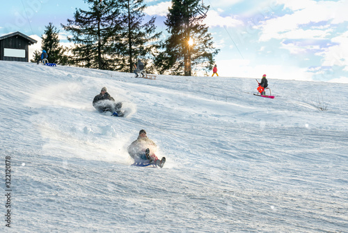 There is a toboggan lift in the winter sports area. Winter fun for families in the sunshine.