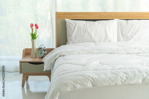 white pillow on bed decoration in bedroom