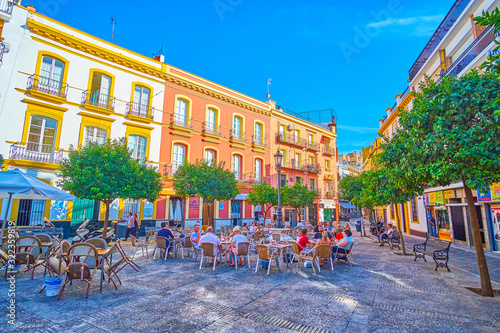 The small square with outdoor cafes, Seville, Spain