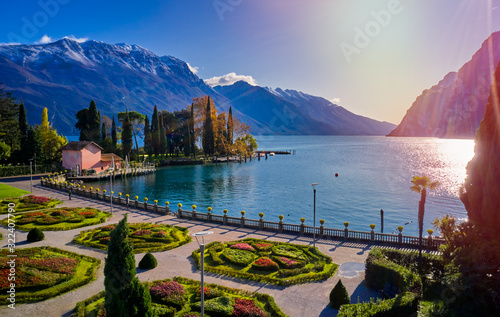 Beautiful and colorful autumn in Riva del Garda,Panorama of the gorgeous Garda lake surrounded by mountains in the autumn time