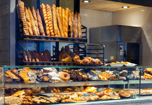 Bakery shop with assortment of bread on shelves