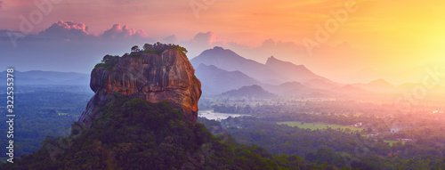 Panoramic view of the famous ancient stone fortress Sigiriya (Lion Rock) on the island of Sri Lanka, which is a UNESCO World Heritage Site.