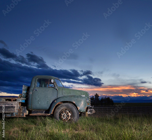 Old truck in sunset. Oldtimer truck. Highway 8 New Zealand
