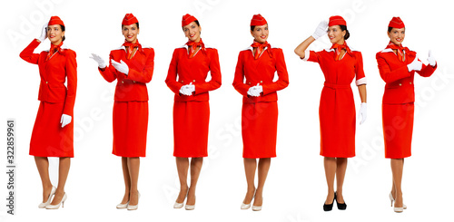 Young beautiful Russian stewardess in red uniform