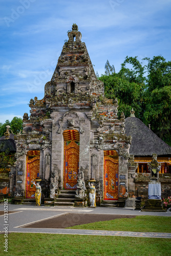Balinese sculptures and traditional architectural details in a temple in Bali, Indonesia