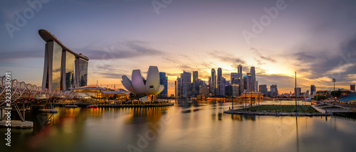 Singapore view from Marina Bay with all the iconic attraction: Art & Science museum, central district, Helix Bridge