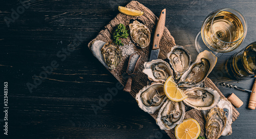 Fresh oysters with lemon ice and white wine.