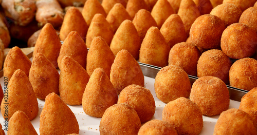 stuffed balls rice is a typical dish of Italy called ARANCINI in