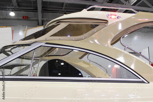 Hardtop cabin exterior of luxury motor boat close up in Elling, yacht storage