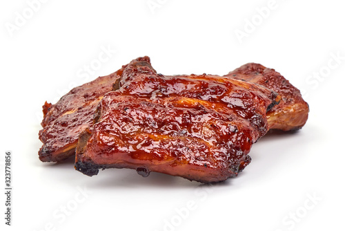 Roasted pork spare ribs in bbq sauce, spicy food, isolated on white background