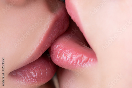 Kiss. I Love You. Lesbian couple in love. Intimate relationship and sexual relations. Closeup lesbian mouths kissing.