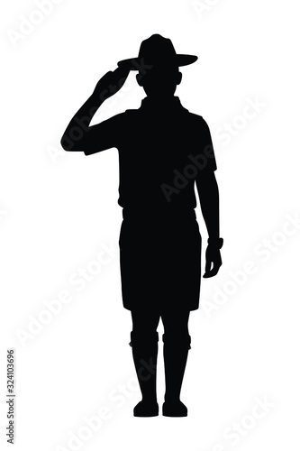 Boy scout with his equipment silhouette vector