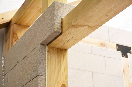 Wooden door lintel under construction