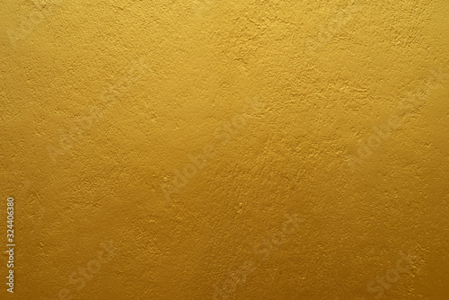 Abstract background of golden cement surface