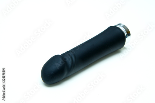 The single big black vibrator isolated on a white background. 