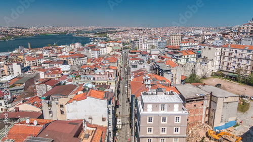 The view from Galata Tower to Golden Horn and city skyline with red roofs timelapse, Istanbul, Turkey