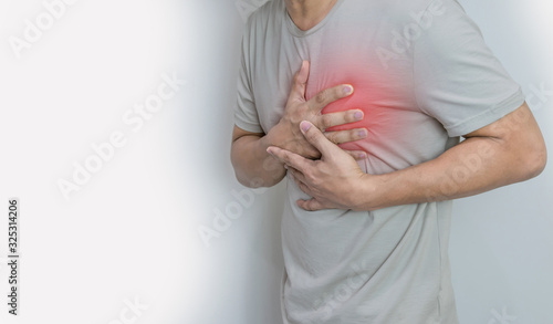 Hands holding chest with symptom heart attack disease