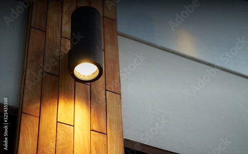 lamp on wooden tile decoration pole with turn on light in dark time