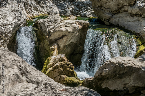 Burano River in Cagli with waterfall and clear water