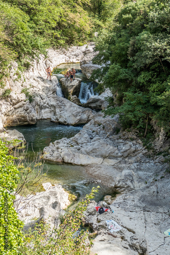 Burano River in Cagli with waterfall and clear water