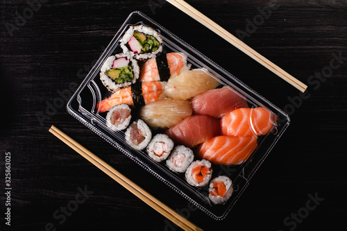 Sushi to go concept. Takeaway box with sushi