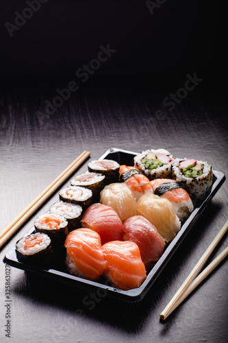 Sushi to go concept. Takeaway box with sushi