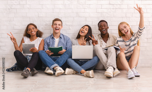 Group of happy students studying for university exams