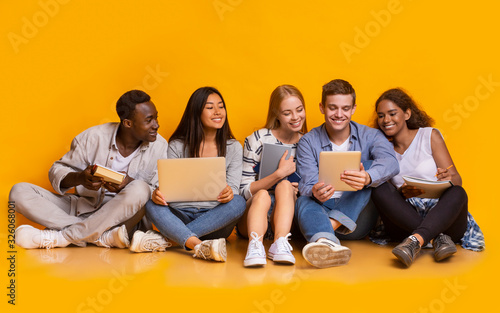 Group of international students studying for university exams