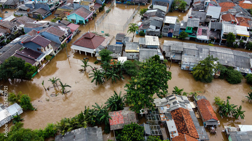 Aerial POV view Depiction of flooding. devastation wrought after massive natural disasters at Bekasi - Indonesia