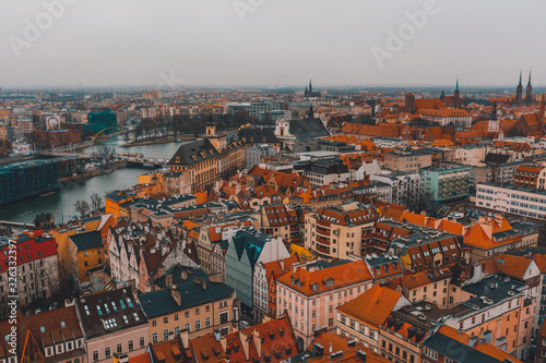 Wroclaw, Picturesque view of the old island of Thum and the Church of Our Lady of the Sand on the tower of St. Iion's Cathedral, Odra River.