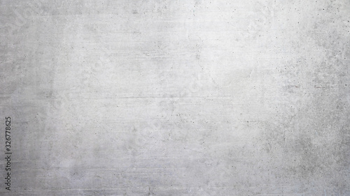 Texture of a smooth gray concrete wall as background or wallpaper